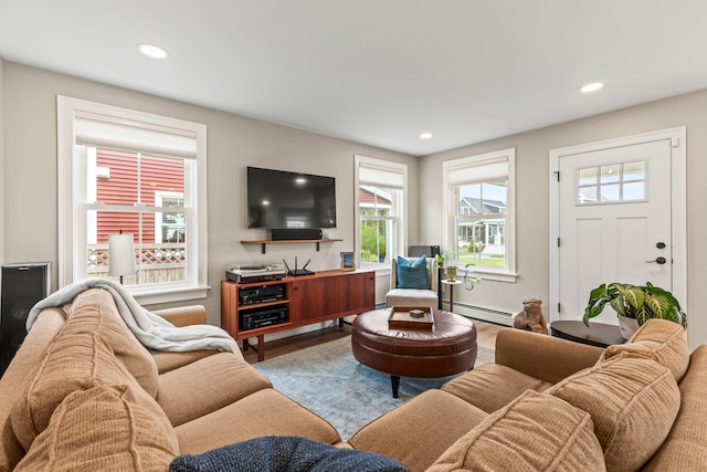 15 Pacer Way, Scarborough, ME 04074 - living room with a baseboard heating unit, healthy amount of natural light, wood finished floors, and recessed lighting