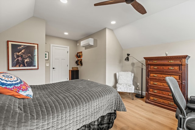 15 Pacer Way, Scarborough, ME 04074 - bedroom with vaulted ceiling, an AC wall unit, light wood-type flooring, a ceiling fan, and recessed lighting