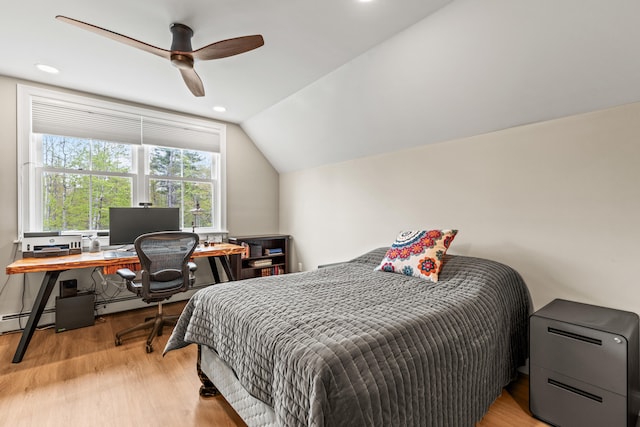 15 Pacer Way, Scarborough, ME 04074 - bedroom featuring light wood-style floors, lofted ceiling, a baseboard heating unit, an office area, and recessed lighting