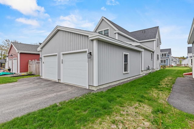 15 Pacer Way, Scarborough, ME 04074 - view of side of home featuring a lawn and board and batten siding