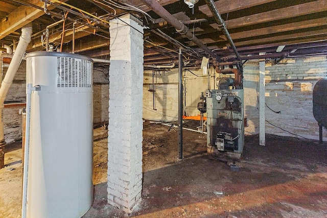 2 Elm Ter, Waterville, ME 04901 - unfinished below grade area with gas water heater and a heating unit