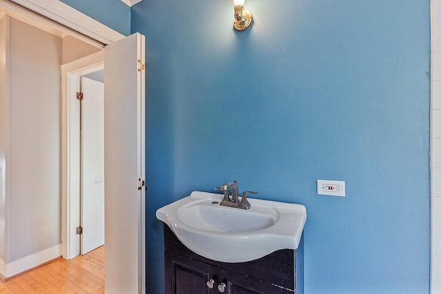 2 Elm Ter, Waterville, ME 04901 - bathroom featuring wood finished floors, baseboards, and vanity