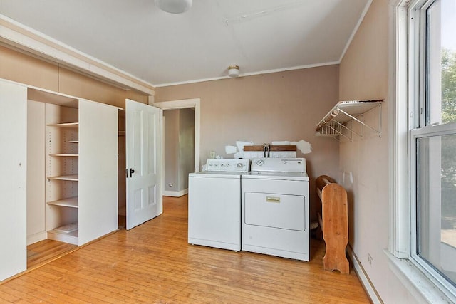 2 Elm Ter, Waterville, ME 04901 - laundry area featuring separate washer and dryer, crown molding, and light wood-style floors