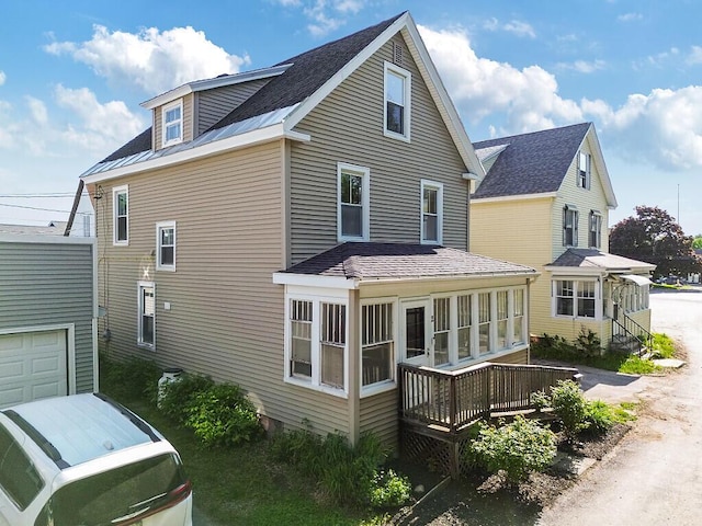 2 Elm Ter, Waterville, ME 04901 - view of side of home featuring a wooden deck and a sunroom