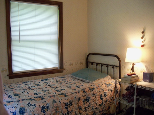 593 S Strong Rd, Strong, ME 04983 - bedroom with wallpapered walls