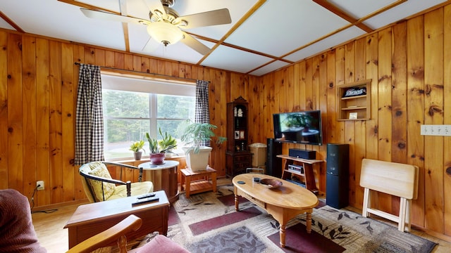574 Scribner Hill Rd, Otisfield, ME 04270 - living room featuring wooden walls and ceiling fan