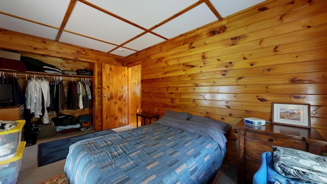 574 Scribner Hill Rd, Otisfield, ME 04270 - carpeted bedroom with a closet and wood walls