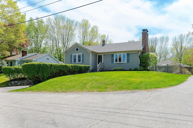 5 Nash Pkwy, Somersworth, NH 03878 - single story home with a chimney