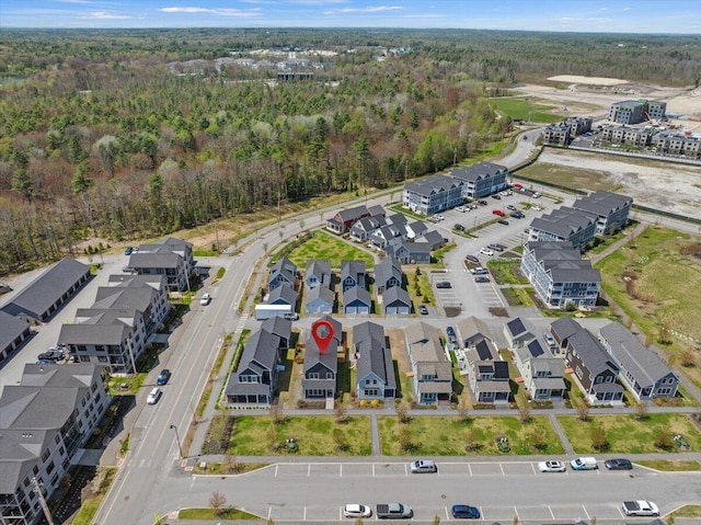 4 Frontrunner Way, Scarborough, ME 04074 - aerial view of property and surrounding area featuring a heavily wooded area