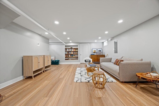 4 Frontrunner Way, Scarborough, ME 04074 - living room featuring light wood finished floors, recessed lighting, electric panel, and baseboards