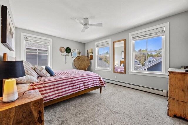 4 Frontrunner Way, Scarborough, ME 04074 - carpeted bedroom with a baseboard radiator and ceiling fan