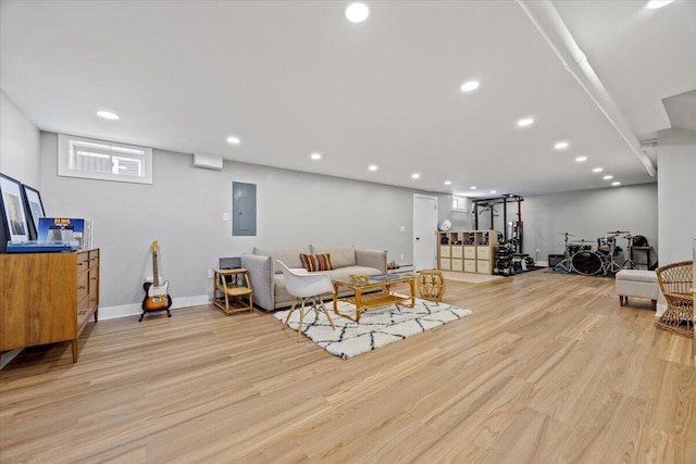 4 Frontrunner Way, Scarborough, ME 04074 - living area featuring light wood finished floors, electric panel, recessed lighting, and baseboards