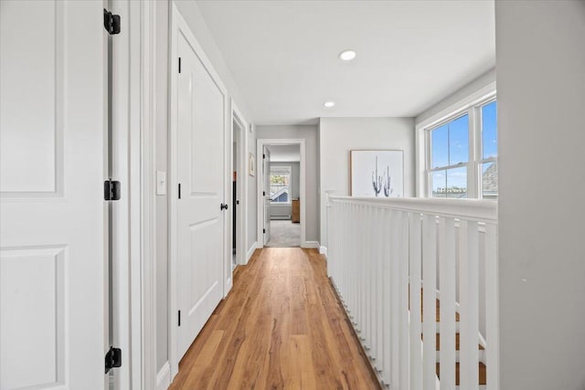 4 Frontrunner Way, Scarborough, ME 04074 - hallway with plenty of natural light, light wood-type flooring, recessed lighting, and baseboards