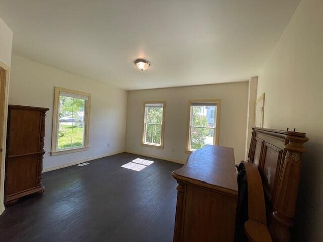 119 Village Rd, Steuben, ME 04680 - office area with plenty of natural light, dark wood finished floors, and baseboards