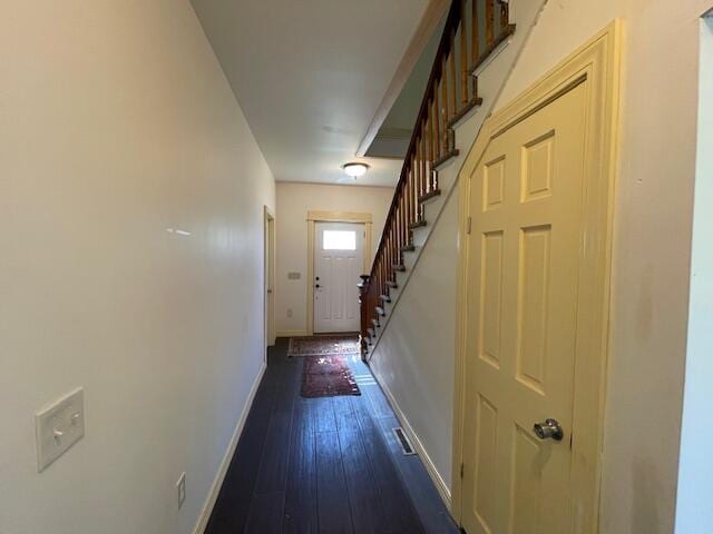 119 Village Rd, Steuben, ME 04680 - doorway to outside featuring baseboards, stairway, and dark wood-type flooring