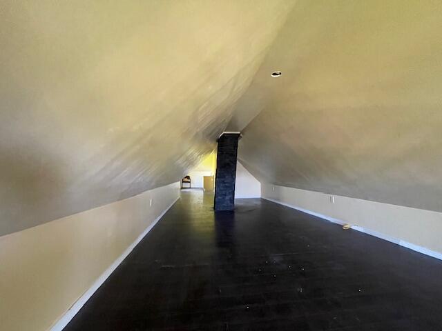 119 Village Rd, Steuben, ME 04680 - additional living space featuring baseboards and vaulted ceiling
