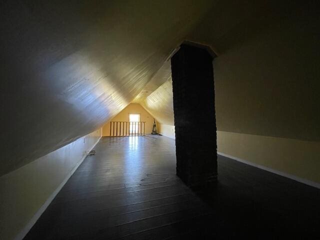 119 Village Rd, Steuben, ME 04680 - bonus room featuring vaulted ceiling, baseboards, and wood-type flooring