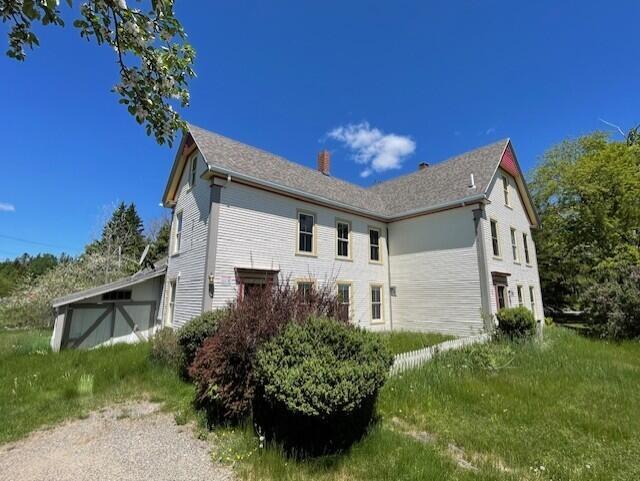 119 Village Rd, Steuben, ME 04680 - view of side of property featuring a chimney