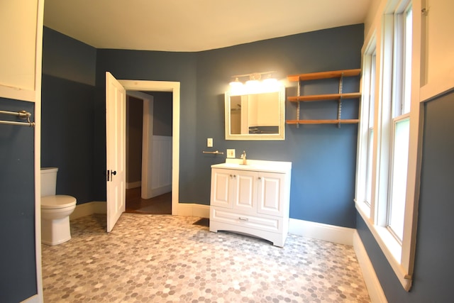 164 Nichols St, Pittsfield, ME 04967 - bathroom featuring vanity, toilet, and baseboards