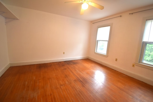 164 Nichols St, Pittsfield, ME 04967 - empty room with wood finished floors, baseboards, and ceiling fan