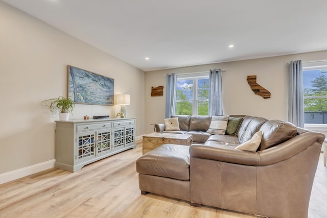 67 Overlook Rd, Windham, ME 04062 - living room featuring plenty of natural light, wood finished floors, recessed lighting, and baseboards