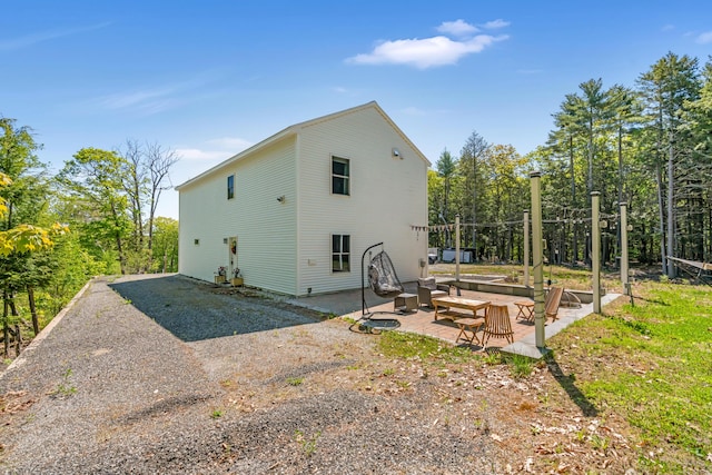 67 Overlook Rd, Windham, ME 04062 - rear view of property with a patio area