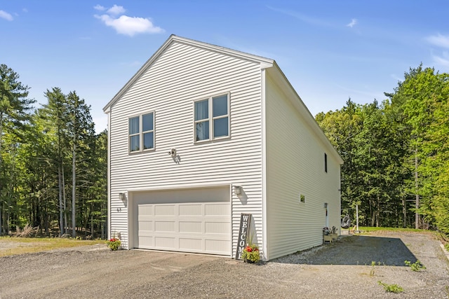 67 Overlook Rd, Windham, ME 04062 - view of property exterior featuring asphalt driveway and an attached garage