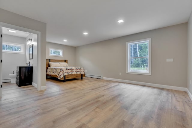 67 Overlook Rd, Windham, ME 04062 - bedroom with baseboard heating, light wood-style floors, baseboards, and recessed lighting