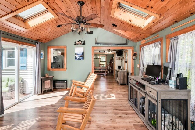 6 Sand Pond Rd, North Berwick, ME 03906 - living room with a skylight, vaulted ceiling, a ceiling fan, wood ceiling, and light wood-style flooring