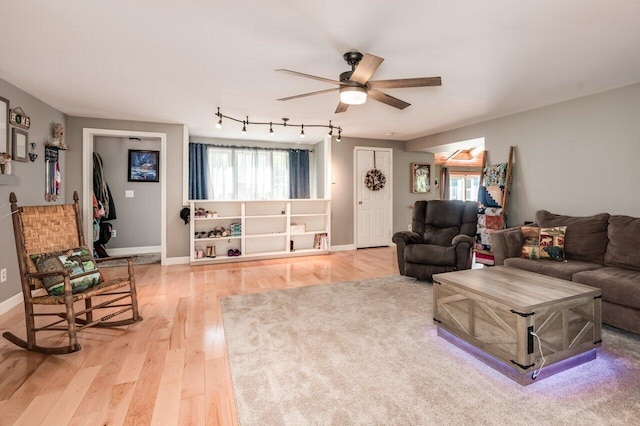 6 Sand Pond Rd, North Berwick, ME 03906 - living area featuring plenty of natural light, light wood-style flooring, ceiling fan, and baseboards