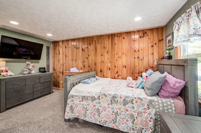 6 Sand Pond Rd, North Berwick, ME 03906 - bedroom with wood walls, carpet floors, and recessed lighting