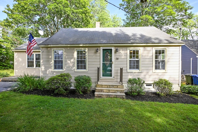 28 Colonial Rd, Westbrook, ME 04092 - new england style home featuring a front lawn, a chimney, and roof with shingles