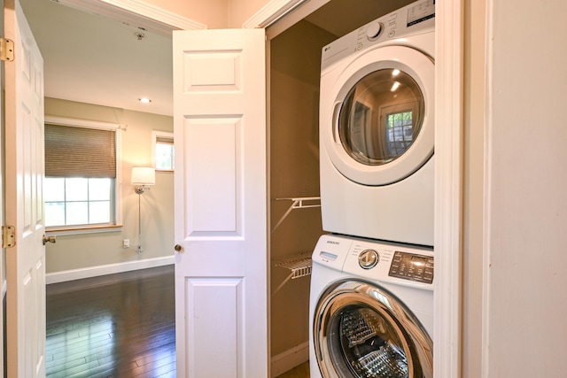 28 Colonial Rd, Westbrook, ME 04092 - laundry area featuring stacked washer / drying machine and wood finished floors