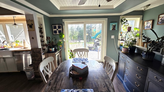 2670 Bennoch Rd, Old Town, ME 04468 - dining space with dark wood-style floors, a ceiling fan, and a raised ceiling