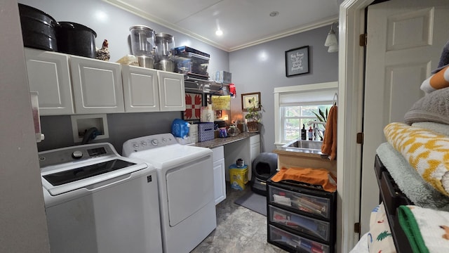 2670 Bennoch Rd, Old Town, ME 04468 - washroom featuring washing machine and dryer, ornamental molding, and cabinet space