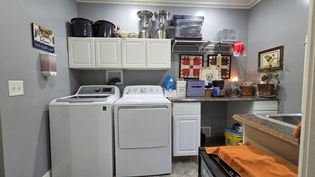 2670 Bennoch Rd, Old Town, ME 04468 - laundry area featuring washer and dryer and cabinet space