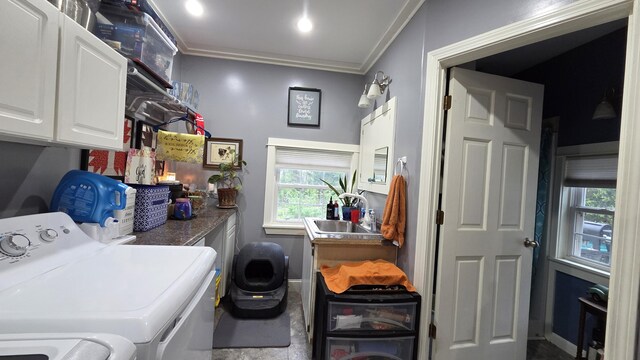 2670 Bennoch Rd, Old Town, ME 04468 - laundry room featuring washing machine and clothes dryer, cabinet space, crown molding, and baseboards