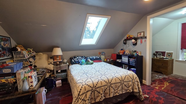 2670 Bennoch Rd, Old Town, ME 04468 - carpeted bedroom featuring vaulted ceiling, a skylight, and multiple windows