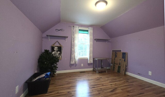 2670 Bennoch Rd, Old Town, ME 04468 - additional living space with wood finished floors, lofted ceiling, and baseboards