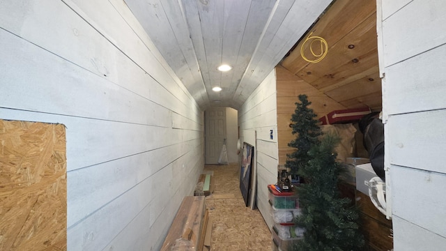 2670 Bennoch Rd, Old Town, ME 04468 - hallway featuring vaulted ceiling and wooden walls