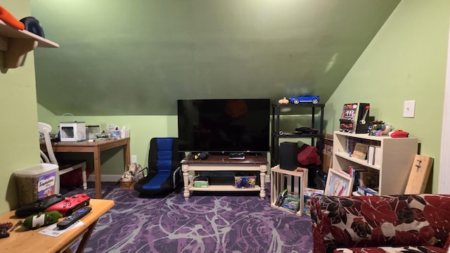 2670 Bennoch Rd, Old Town, ME 04468 - carpeted living room featuring vaulted ceiling
