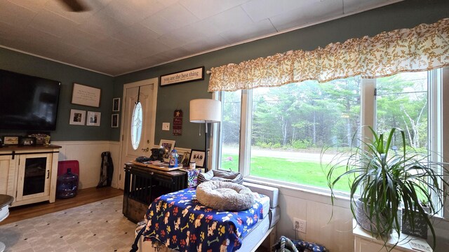 2670 Bennoch Rd, Old Town, ME 04468 - living room featuring wainscoting and ornamental molding