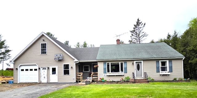 2670 Bennoch Rd, Old Town, ME 04468 - cape cod home featuring a chimney, a front yard, a garage, driveway, and entry steps