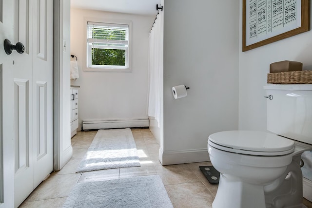 6 Emerald Ct, Berwick, ME 03901 - bathroom featuring a baseboard radiator, toilet, tile patterned flooring, and baseboards