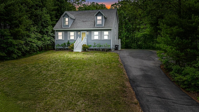 6 Emerald Ct, Berwick, ME 03901 - cape cod house featuring a yard, driveway, and roof with shingles