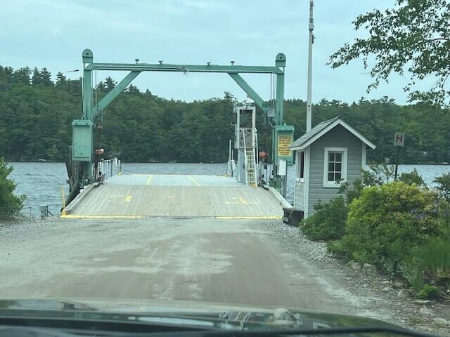 166 Ridge Rd, Frye Island, ME 04071 - view of street with a forest view and a gated entry