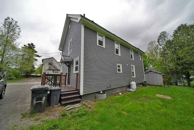 29 Columbia St, Houlton, ME 04730 - view of side of property with a yard