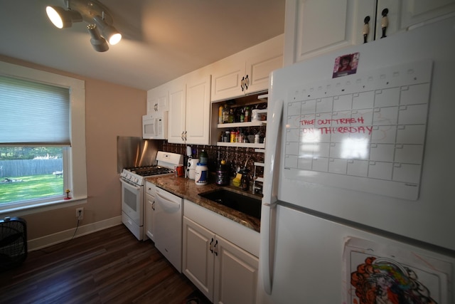 29 Columbia St, Houlton, ME 04730 - kitchen featuring white appliances, white cabinets, dark wood-type flooring, a sink, and baseboards