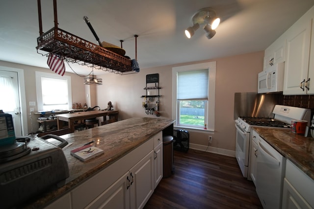 29 Columbia St, Houlton, ME 04730 - kitchen featuring white appliances, plenty of natural light, white cabinetry, and dark wood-style flooring