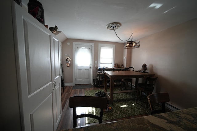 29 Columbia St, Houlton, ME 04730 - foyer featuring wood finished floors, baseboards, lofted ceiling, and a baseboard radiator